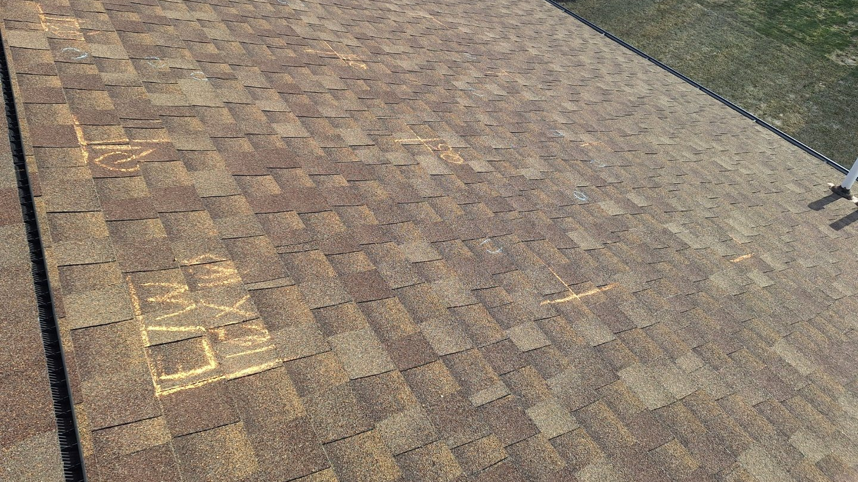 Roofing contractor documenting hail damage with Contractorfy evidence capture